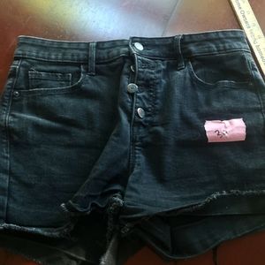 Black denim distressed button fly